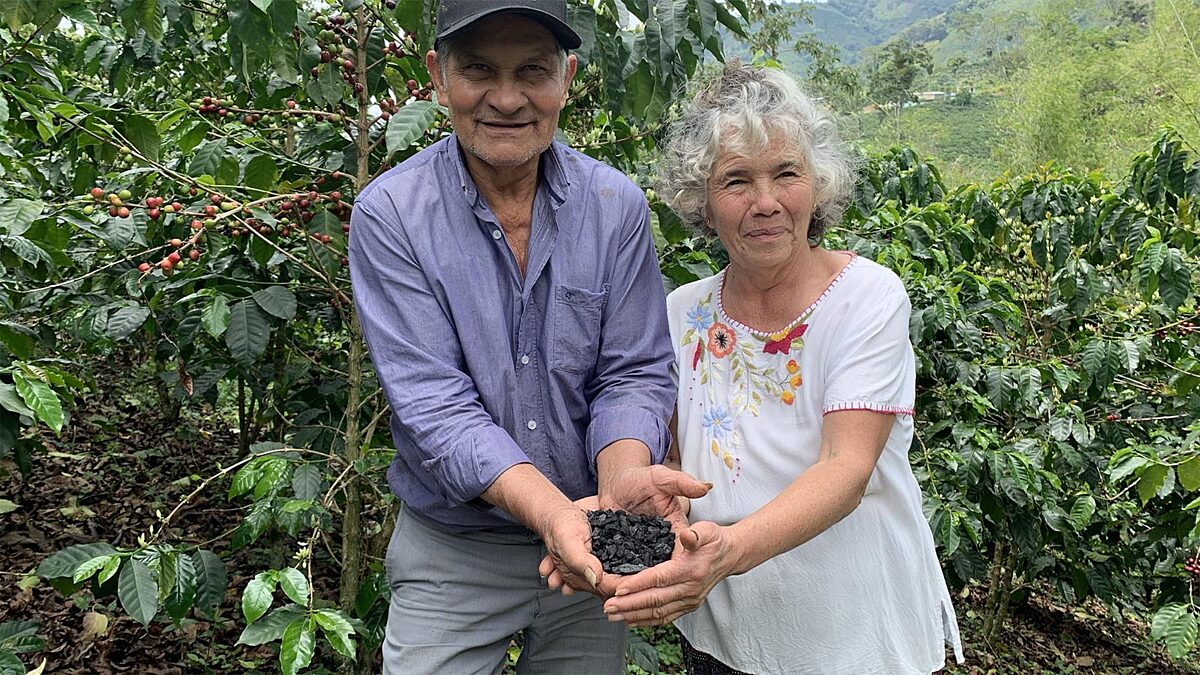 Farmers with biochar in Colombia