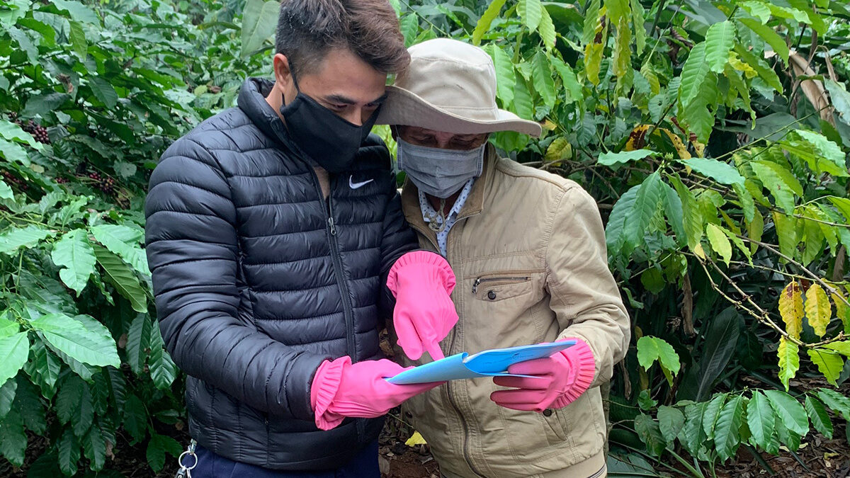 A farmer and Volcafe field advisor in Vietnam