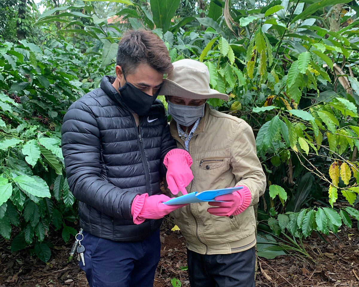 A farmer and Volcafe field advisor in Vietnam