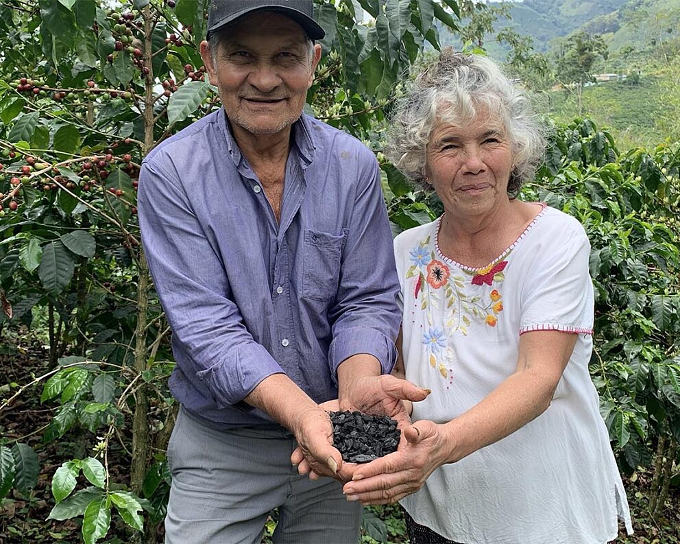 Farmers with biochar in Colombia