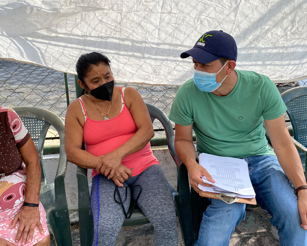 Patients and volunteer at mobile clinic