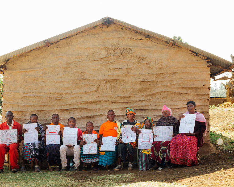 Farmers show their Gender Balance Tree (GBT) from a GALS workshop