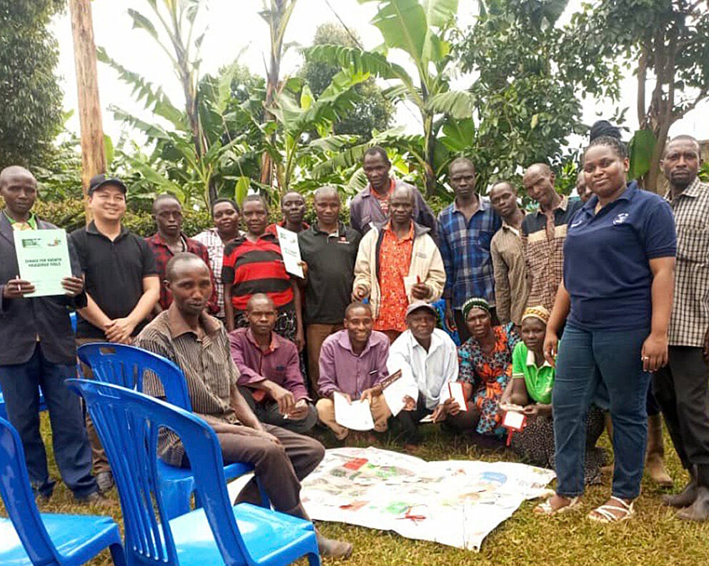 Loc attends a training for coffee farmers, Uganda